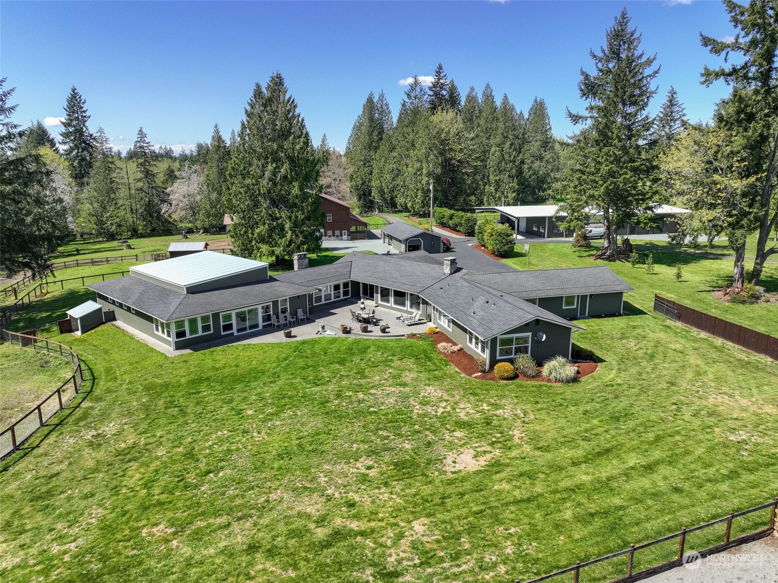 11821 Wagner Road Monroe, WA 98272 - Photo 5 of 40 a view of backyard with swimming pool outdoor seating and green space