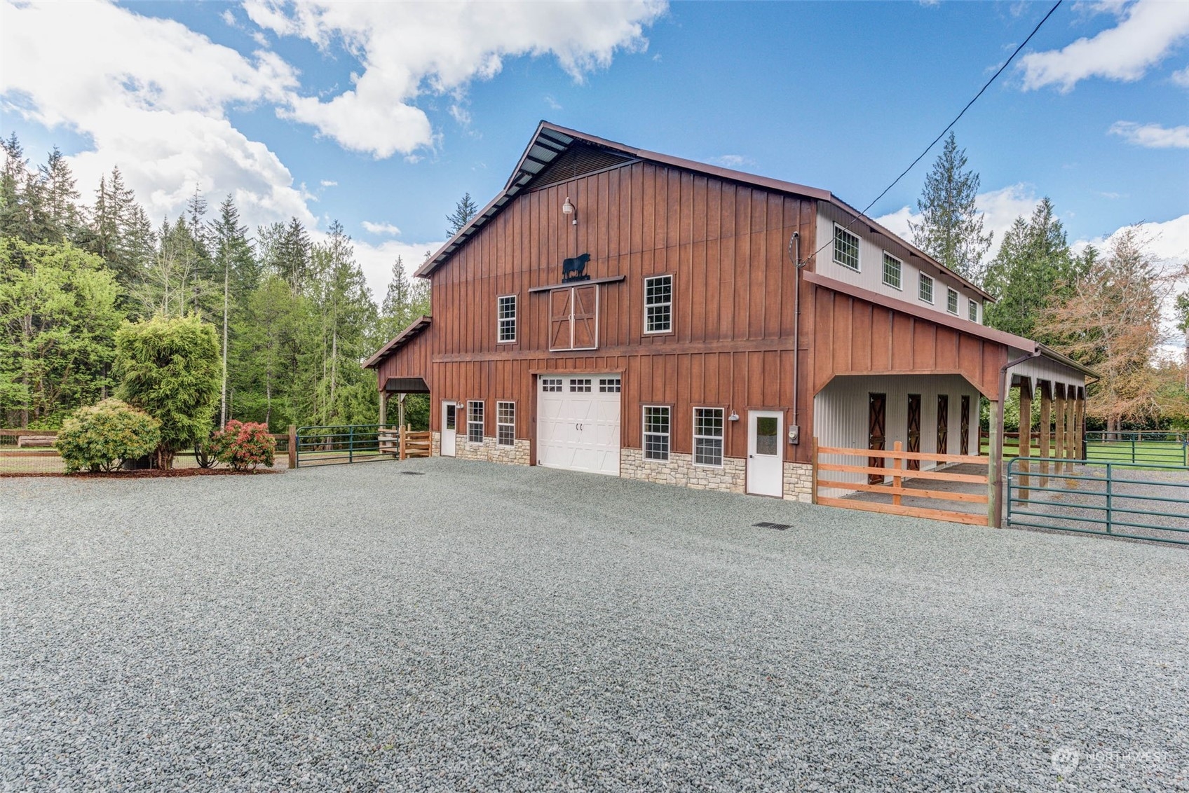 11821 Wagner Road Monroe, WA 98272 - Photo 7 of 40 a front view of a house with a yard