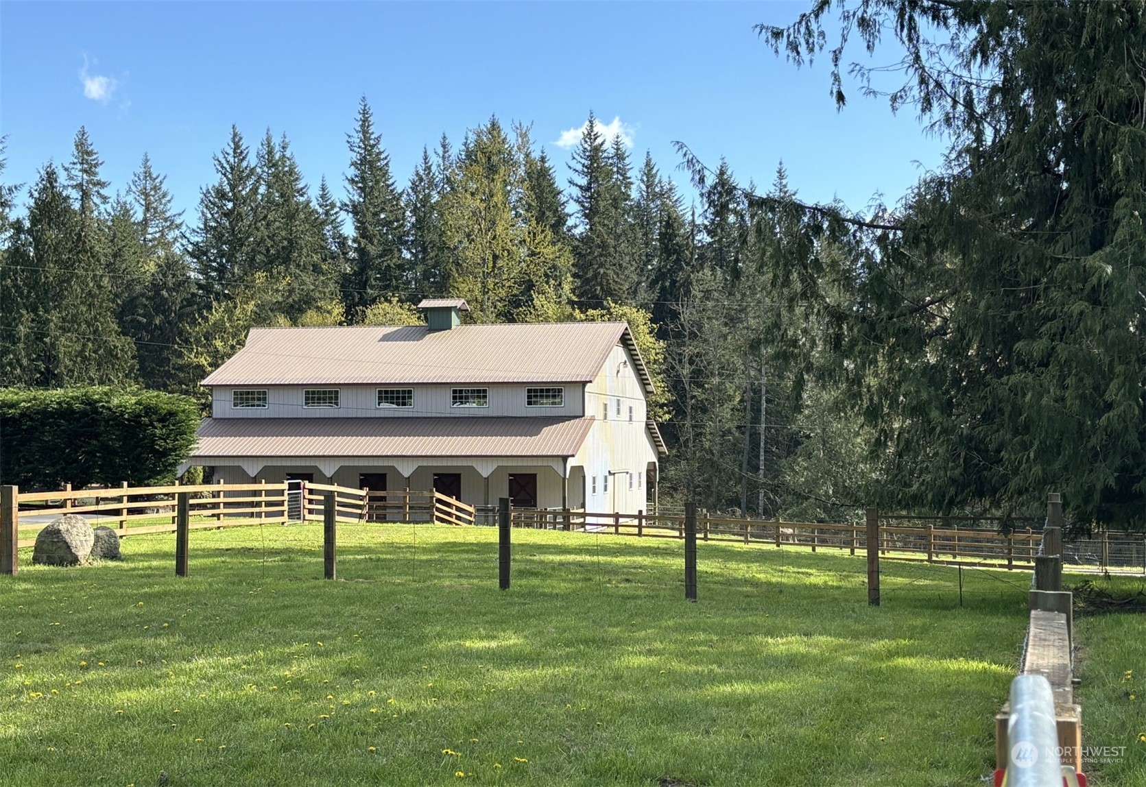 11821 Wagner Road Monroe, WA 98272 - Photo 8 of 40 a view of a house with a backyard and a slide