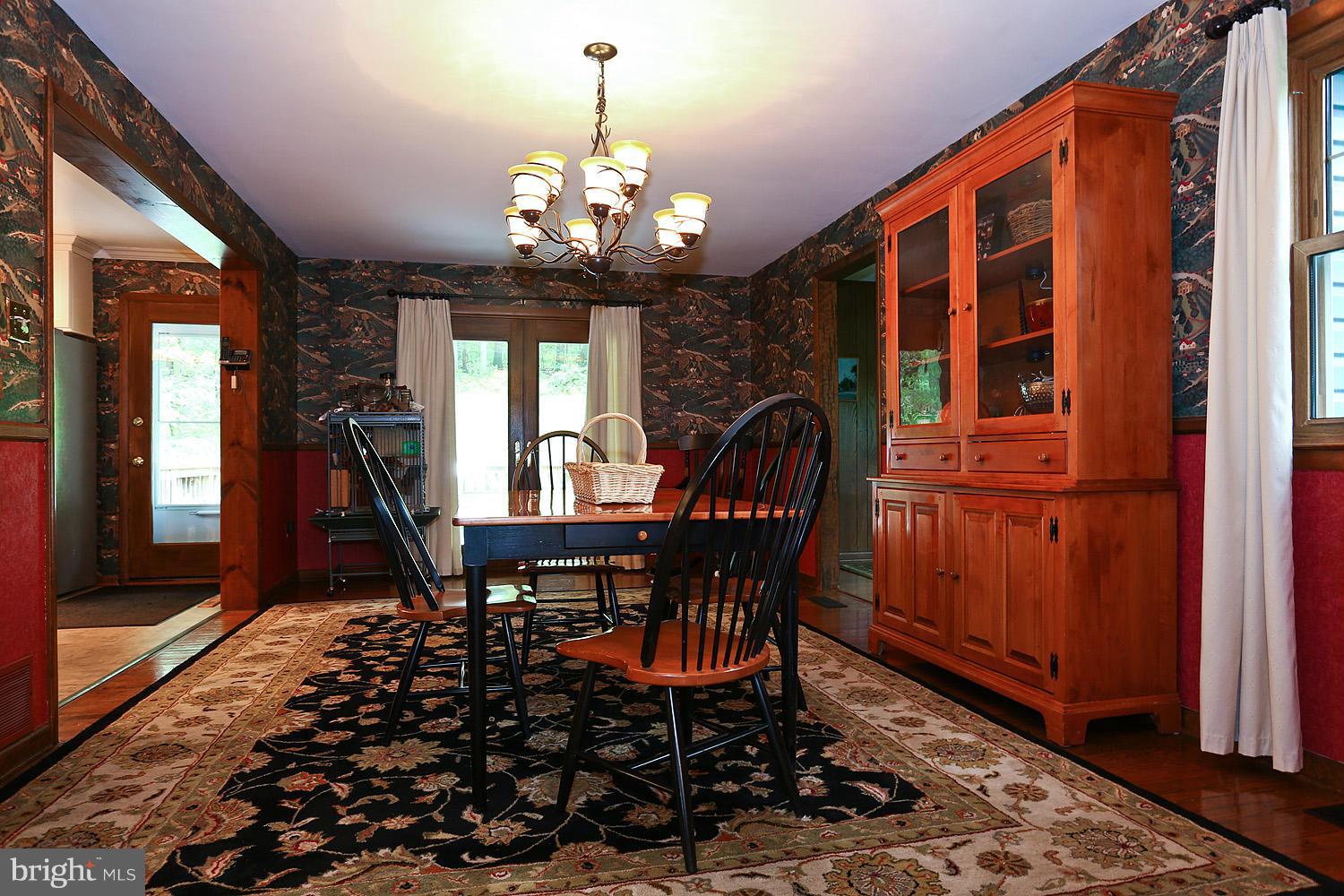 413 Leppo Road Westminster, MD 21158 - Photo 12 of 30 Dining Room French Doors to Deck