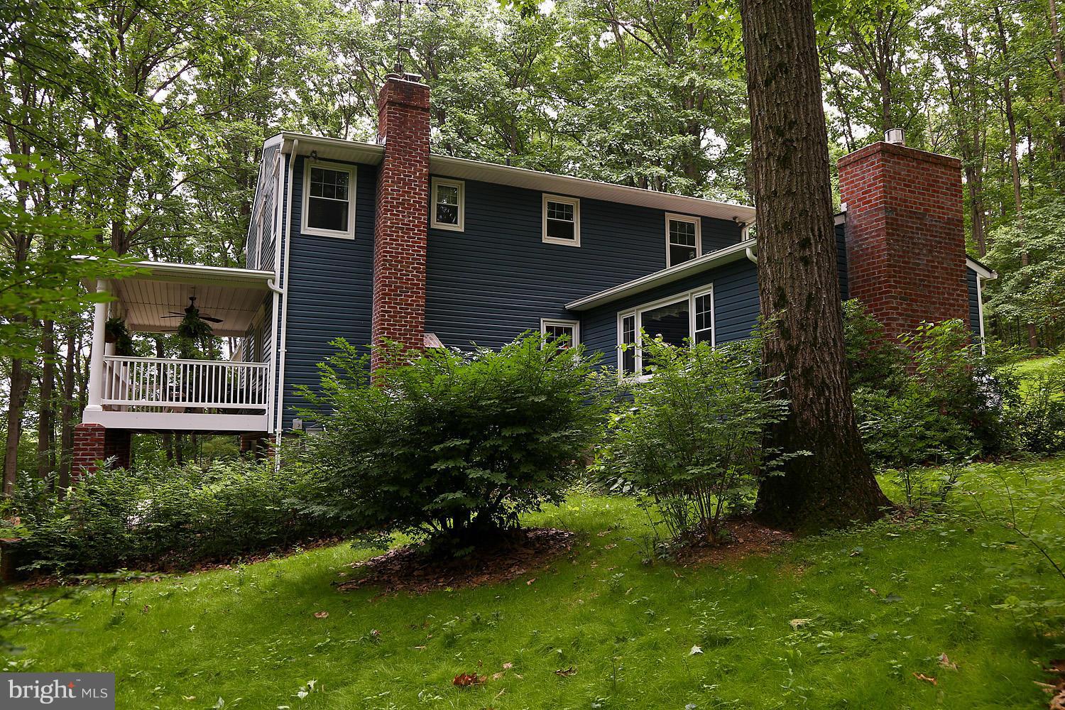 413 Leppo Road Westminster, MD 21158 - Photo 5 of 30 Exterior Side View of Fam Rm and Porch