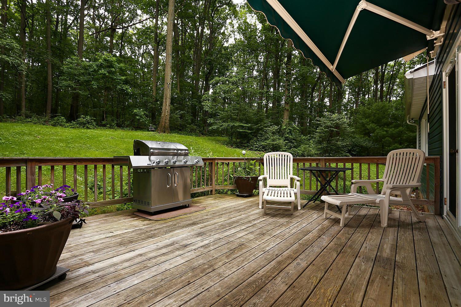 413 Leppo Road Westminster, MD 21158 - Photo 8 of 30 Deck With Awning and Wooded View