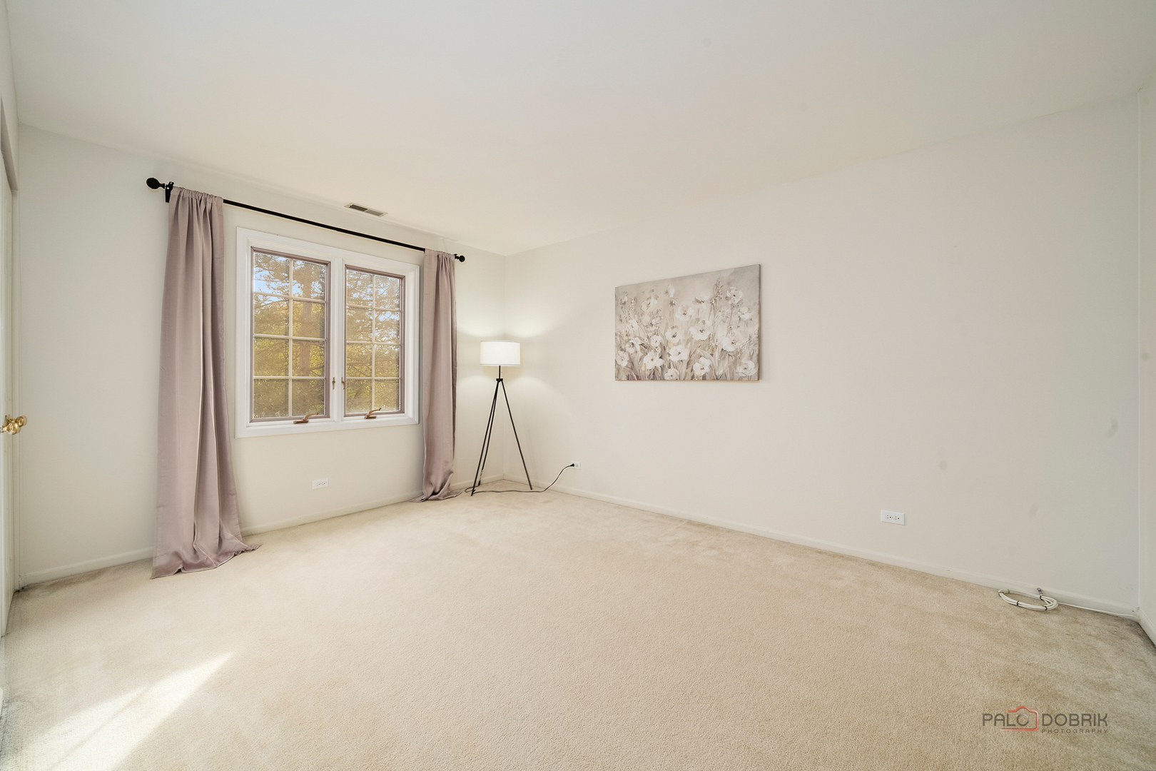 970 Ivy Lane, Unit C Deerfield, IL 60015 - Photo 31 of 36 a view of an empty room with a window