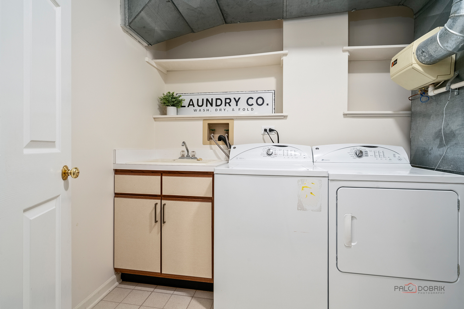 970 Ivy Lane, Unit C Deerfield, IL 60015 - Photo 34 of 36 a utility room with dryer and washer