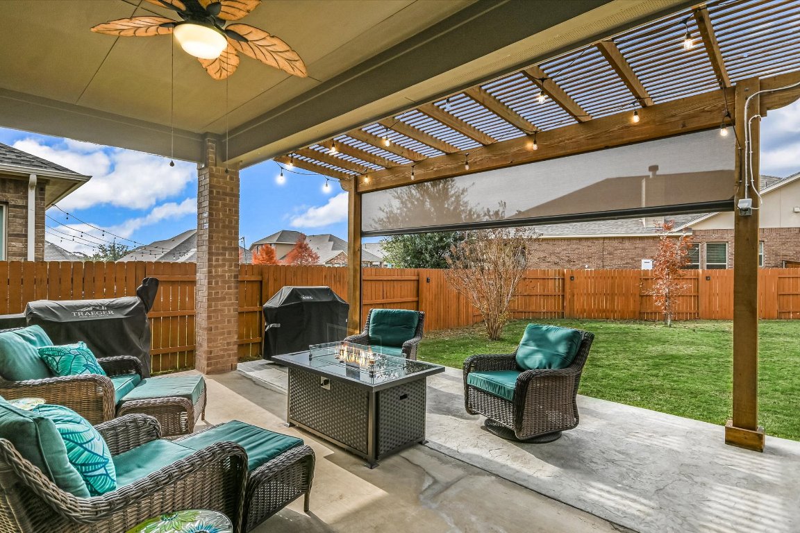 921 Isaias Drive Leander, TX 78641 - Photo 16 of 21 a outdoor living space with furniture and garden view