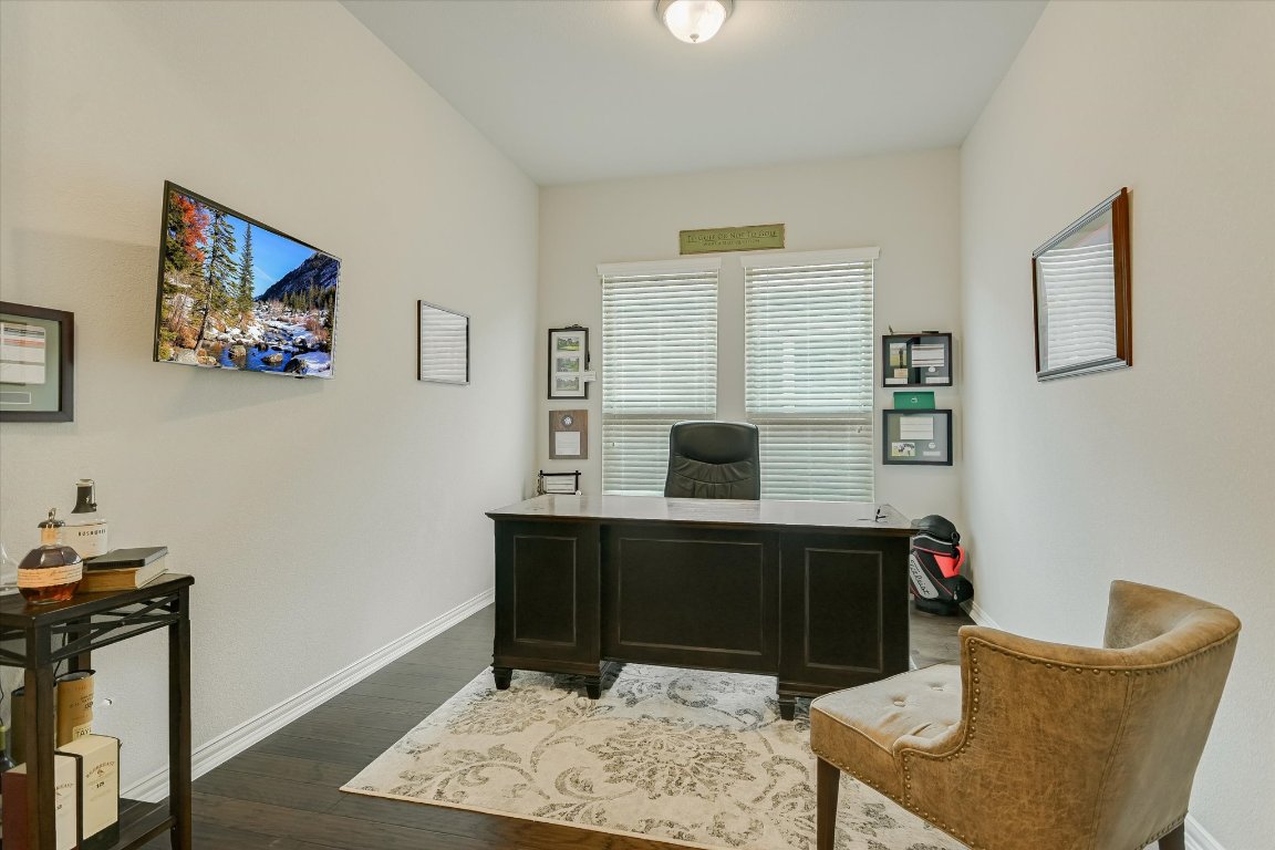 921 Isaias Drive Leander, TX 78641 - Photo 8 of 21 a view of a workspace with furniture