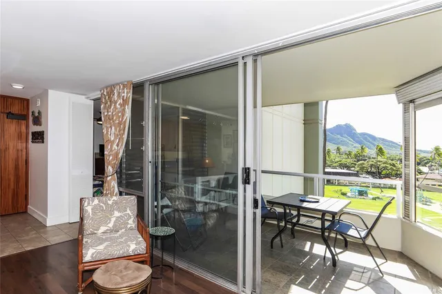 a kitchen with a stove a sink and a granite counter tops