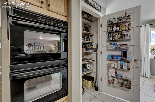 8460 Tibbs Road Peyton, CO 80831 - Photo 12 of 37 Double Oven and Pantry
