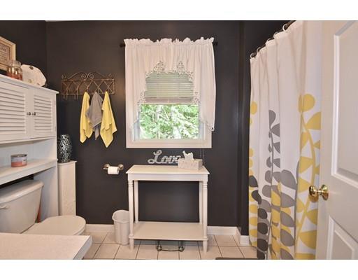 18 Terrace Street Fall River, MA 02721 - Photo 4 of 9 a bathroom with a sink vanity and a mirror