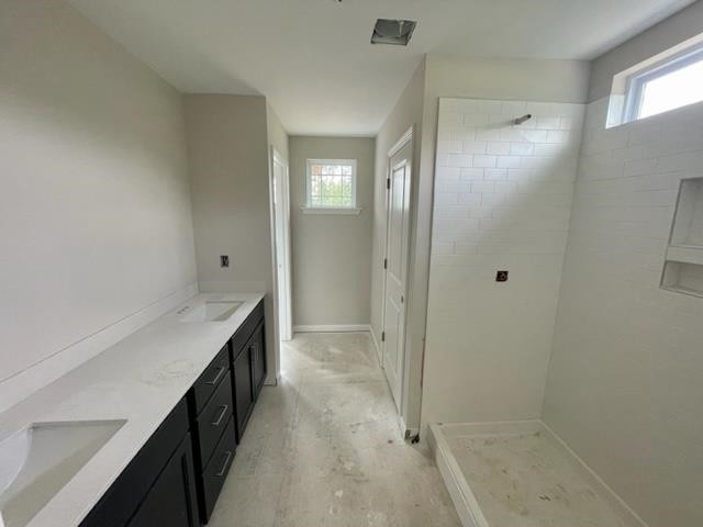 296 Great Pine Trail Middlesex, NC 27557 - Photo 13 of 16 a bathroom with a sink and shower