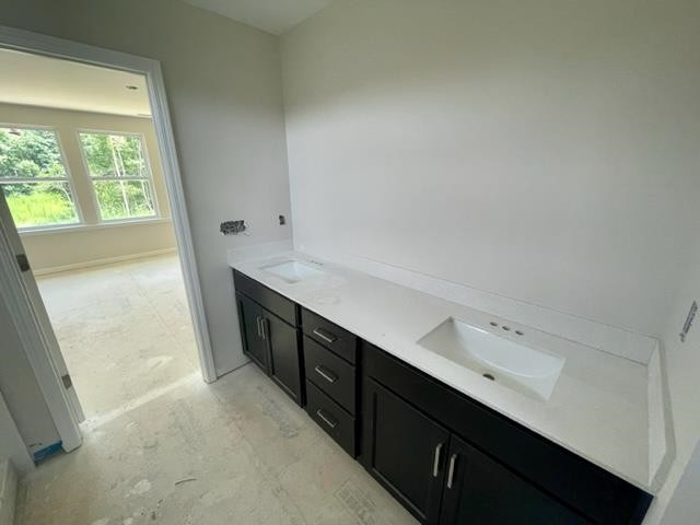 296 Great Pine Trail Middlesex, NC 27557 - Photo 14 of 16 a hallway with a sink and a window