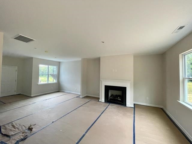296 Great Pine Trail Middlesex, NC 27557 - Photo 2 of 16 an empty room with windows