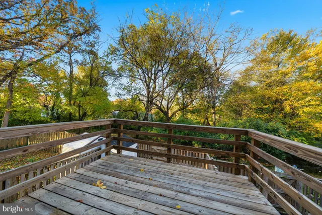 a view of outdoor space with wooden deck