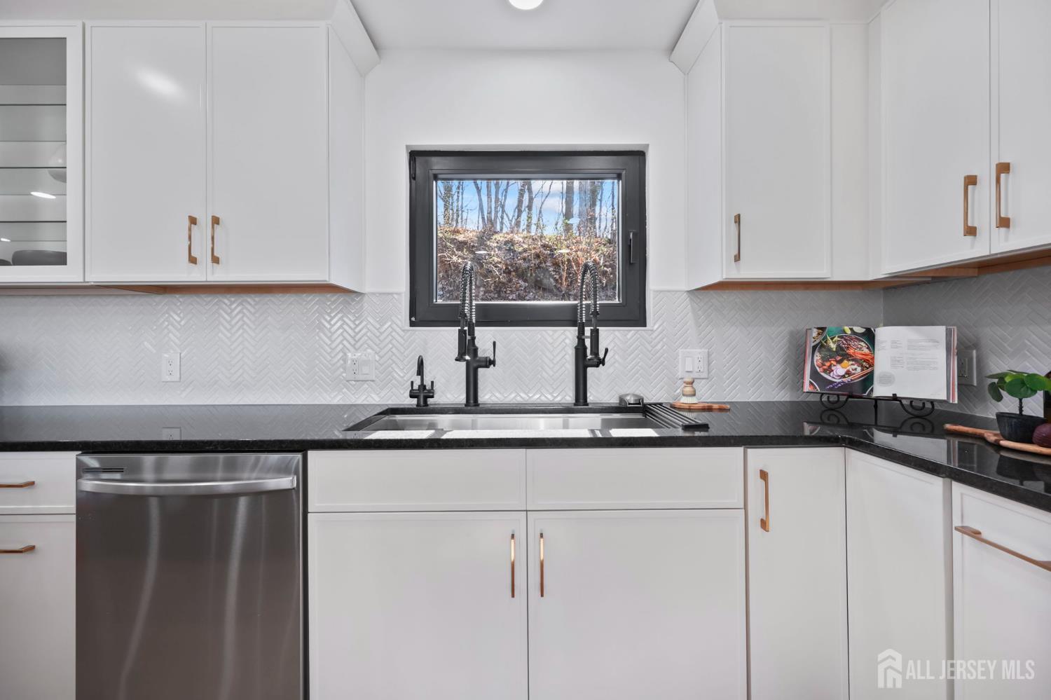120 Nolan Road Morganville, NJ 07751 - Photo 5 of 85 a kitchen with granite countertop a sink cabinets and window