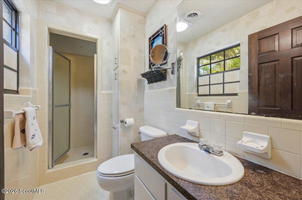554 Old Plantation Road Jekyll Island, GA 31527 - Photo 21 of 58 Primary Bath single vanity shower only