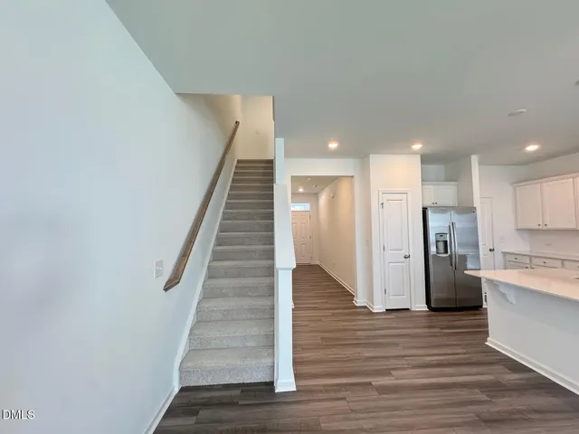 a view of empty room with windows