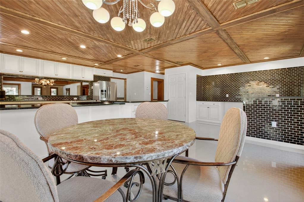 12903 112th Avenue Alachua, FL 32615 - Photo 18 of 95 a view of a dining room with furniture