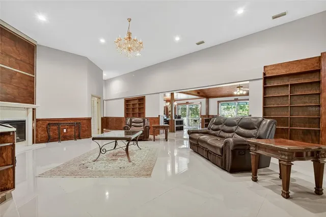 a view of livingroom with fireplace wooden floor and window