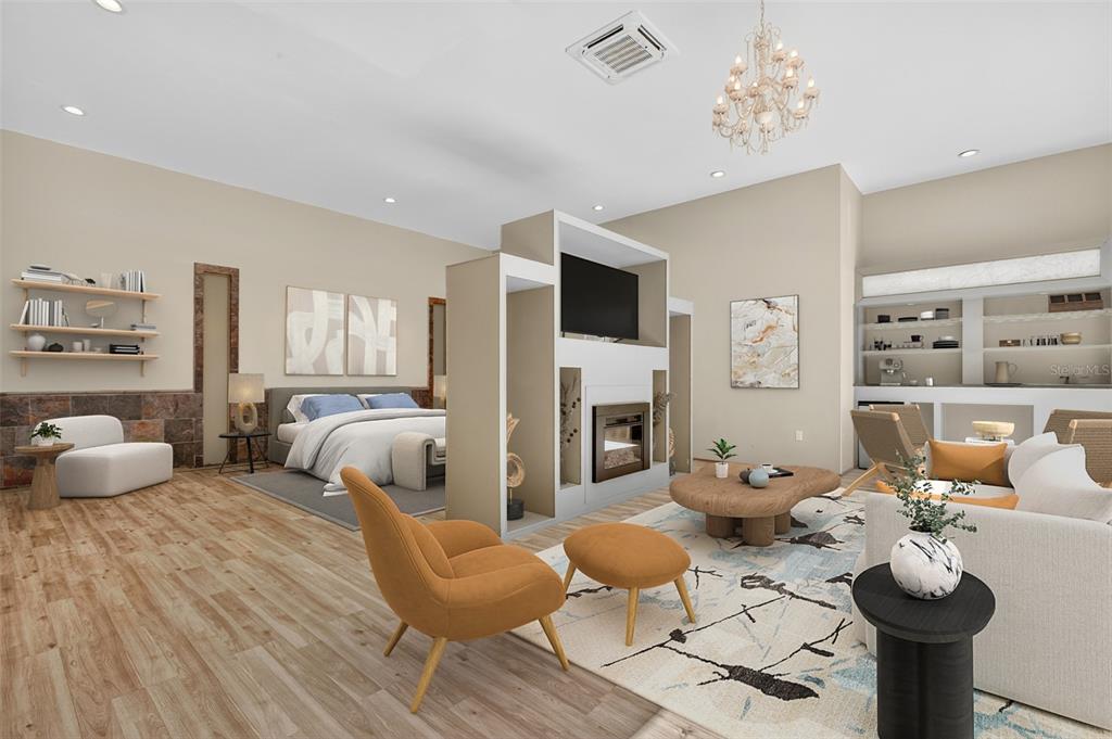 12903 112th Avenue Alachua, FL 32615 - Photo 27 of 95 a bedroom with furniture and a fireplace