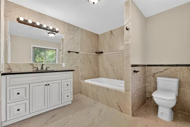 a view of a golf course with a lake