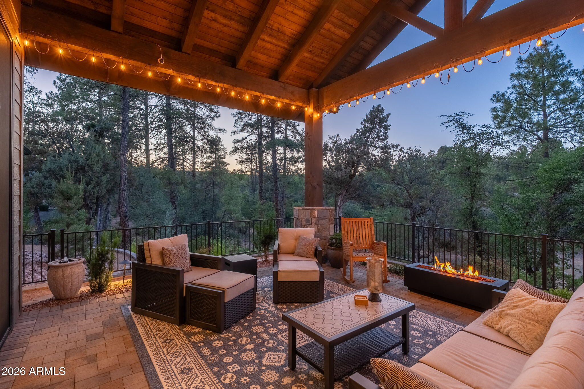 602 North Redbud Circle Payson, AZ 85541 - Photo 61 of 83 a view of a patio with couches and a table and chairs with wooden floor