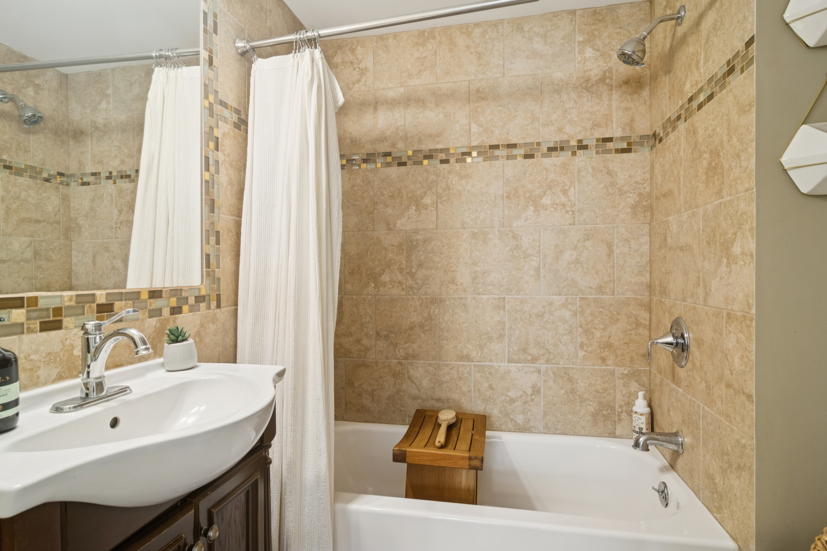 212 Washington Street Barrington, IL 60010 - Photo 22 of 55 a bathroom with a sink a mirror a shower and a bathtub