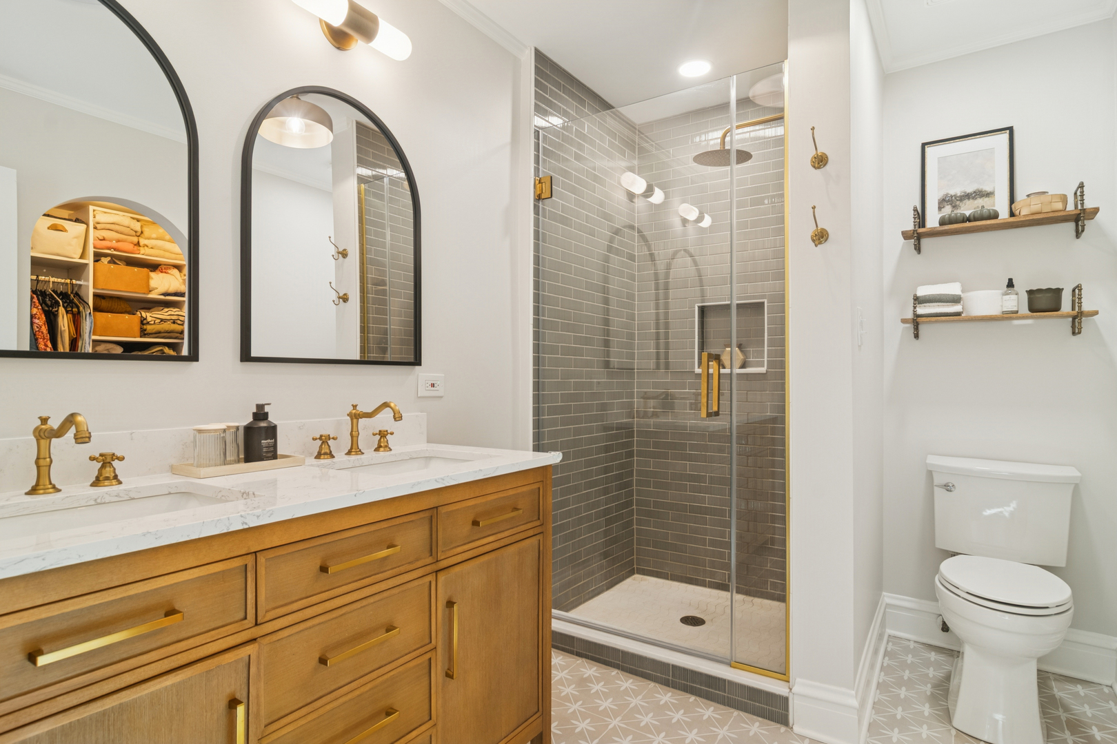 212 Washington Street Barrington, IL 60010 - Photo 28 of 55 a bathroom with a double vanity sink toilet and shower