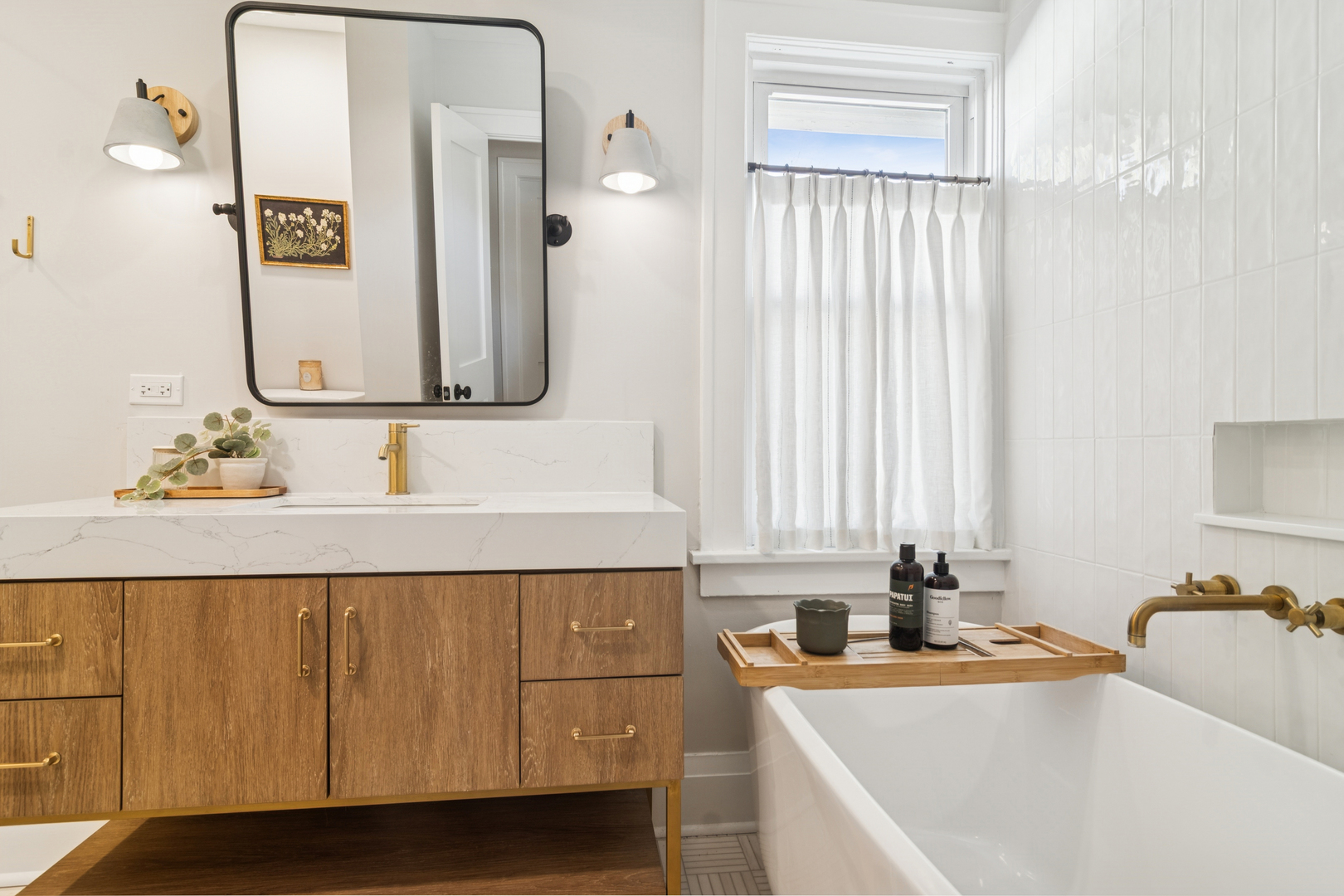 212 Washington Street Barrington, IL 60010 - Photo 31 of 55 a bathroom with a sink and a mirror
