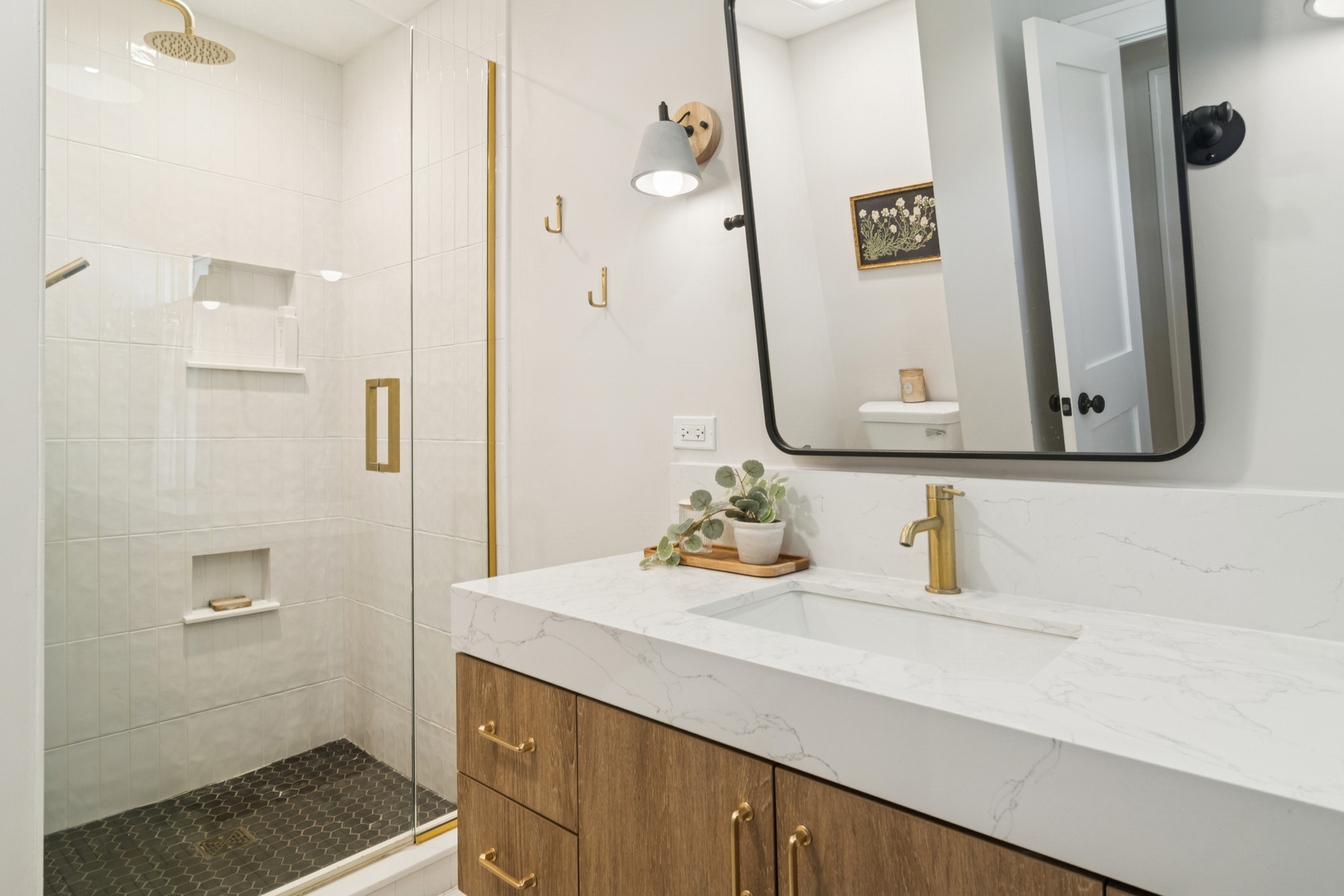 212 Washington Street Barrington, IL 60010 - Photo 32 of 55 a bathroom with a sink and a mirror