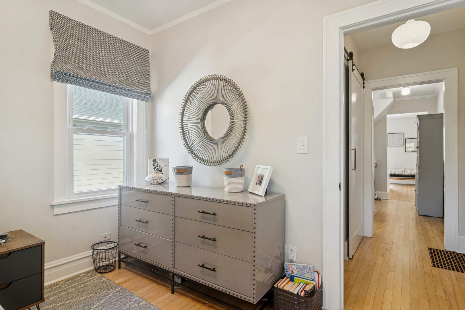 212 Washington Street Barrington, IL 60010 - Photo 35 of 55 a room with a baby crib and a dresser