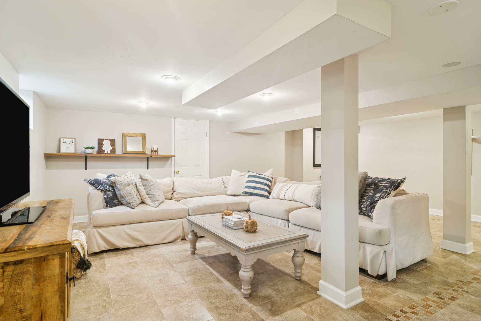 212 Washington Street Barrington, IL 60010 - Photo 37 of 55 a living room with furniture and a flat screen tv