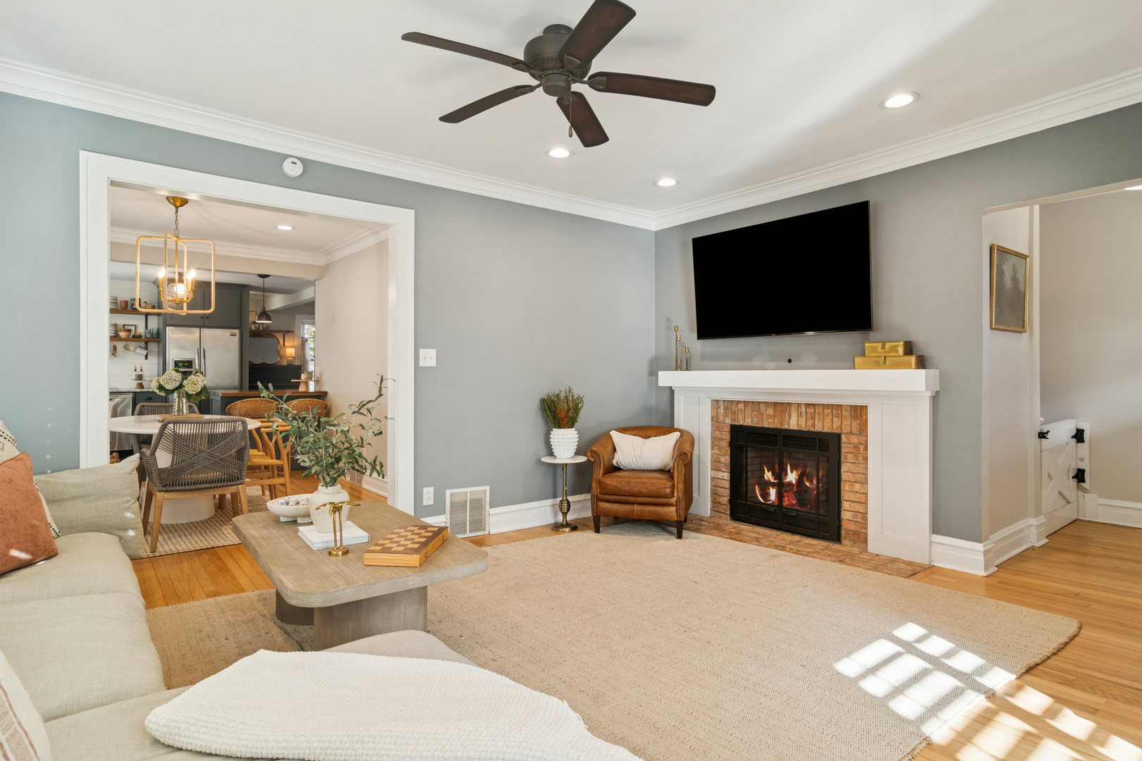 212 Washington Street Barrington, IL 60010 - Photo 4 of 55 a living room with furniture a fireplace and a flat screen tv