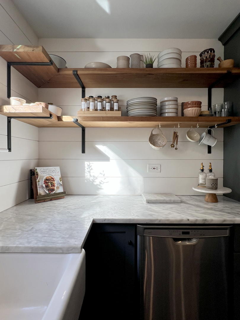 212 Washington Street Barrington, IL 60010 - Photo 46 of 55 a kitchen with a sink a stove and cabinets