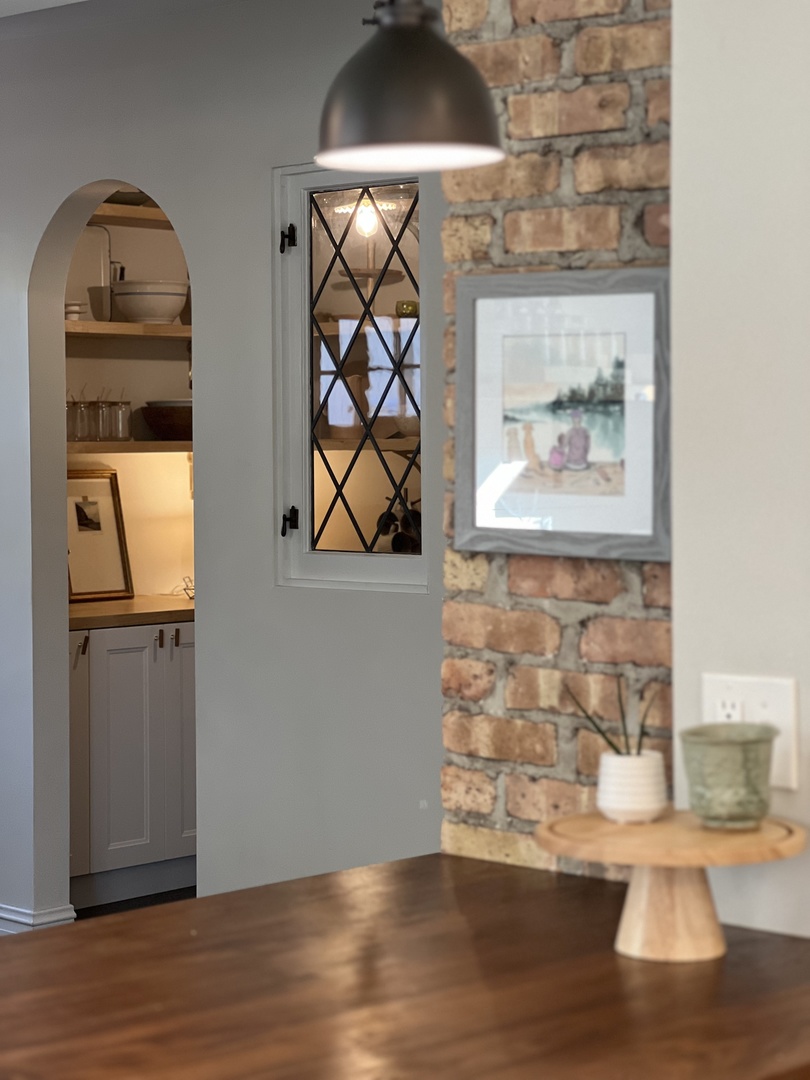 212 Washington Street Barrington, IL 60010 - Photo 47 of 55 an empty room with wooden floor painted walls and a painting