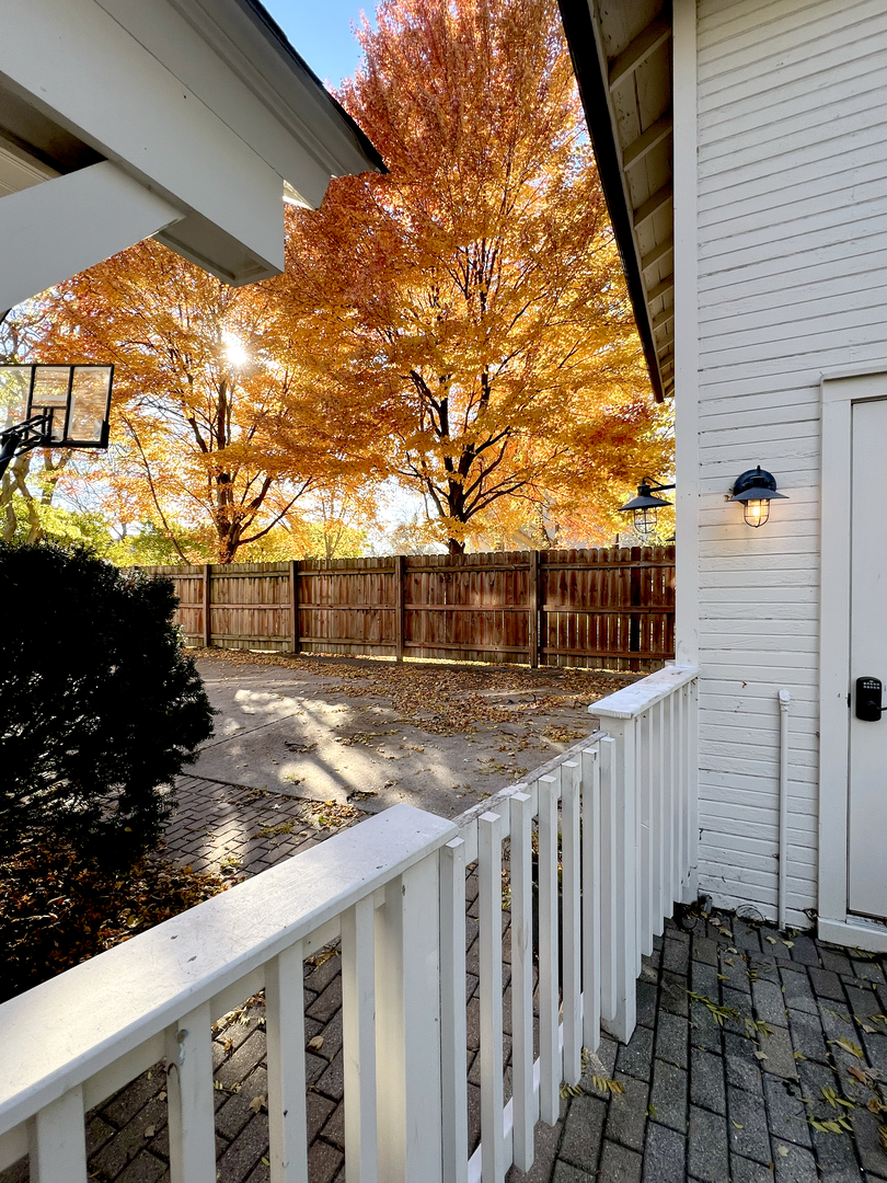 212 Washington Street Barrington, IL 60010 - Photo 50 of 55 a view of a yard with wooden fence