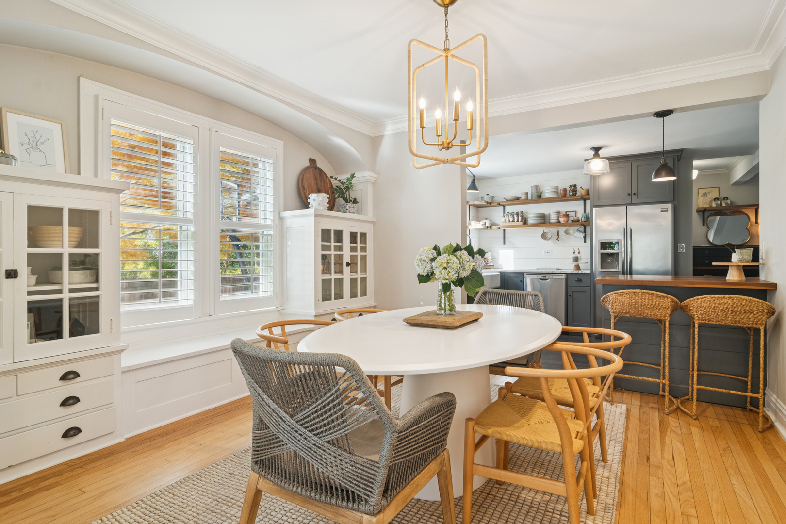 212 Washington Street Barrington, IL 60010 - Photo 8 of 55 a dining room with furniture a chandelier and wooden floor