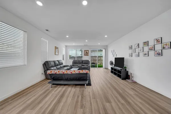 a bed room with a bed and a window