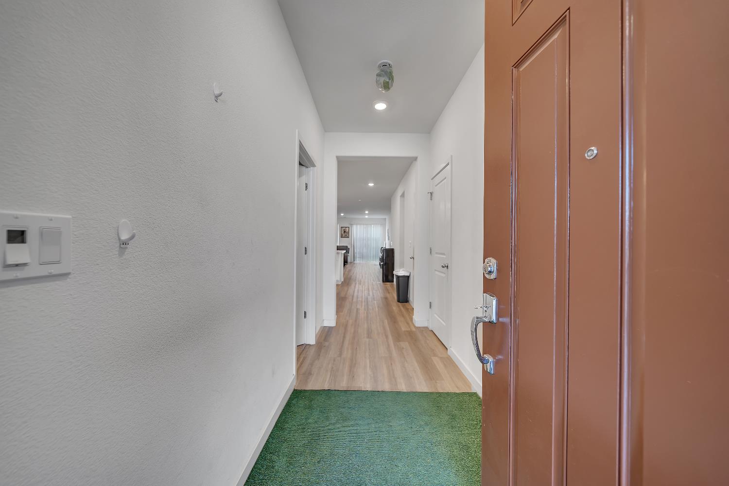 4806 Ariel Street Keyes, CA 95328 - Photo 27 of 42 a view of a room with wooden floor and a bathroom