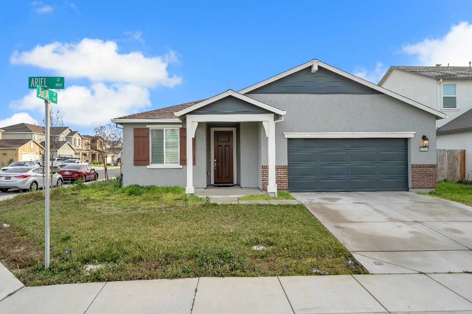 4806 Ariel Street Keyes, CA 95328 - Photo 3 of 42 a front view of a house with a yard