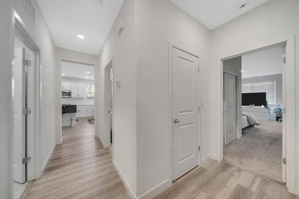 a bathroom with a bathtub and a sink