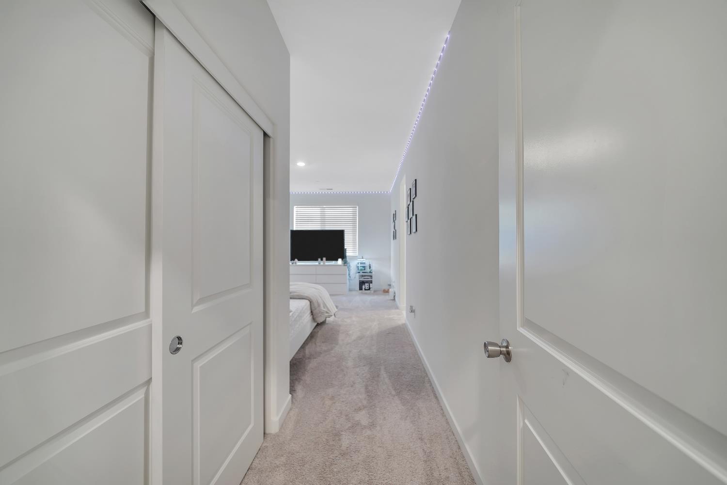 4806 Ariel Street Keyes, CA 95328 - Photo 36 of 42 a view of a hallway with a white walls