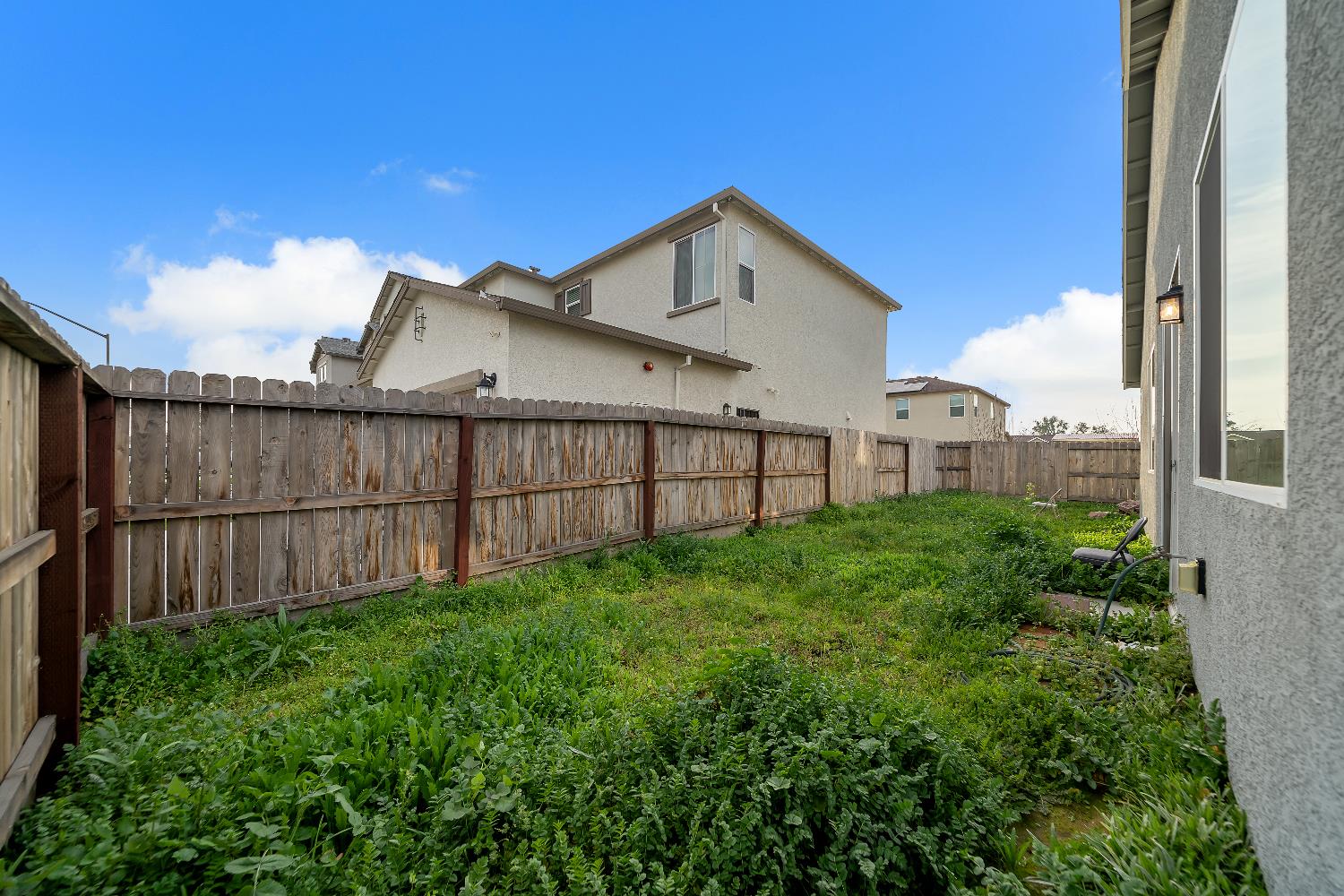 4806 Ariel Street Keyes, CA 95328 - Photo 42 of 42 a view of a backyard with a garden
