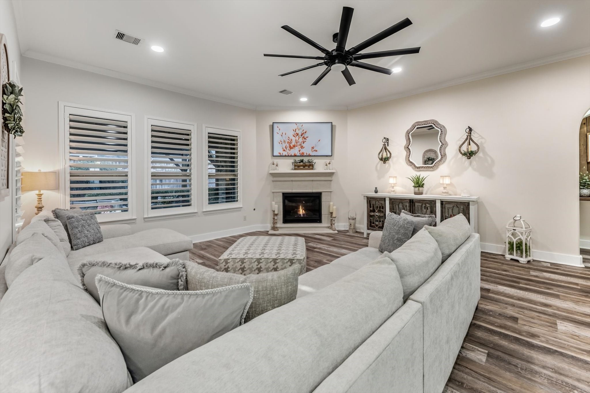 103 Fox Rindle Road Montgomery, TX 77316 - Photo 10 of 44 The contemporary gas fireplace anchors the room with a clean, sophisticated presence that draws the eye instantly.