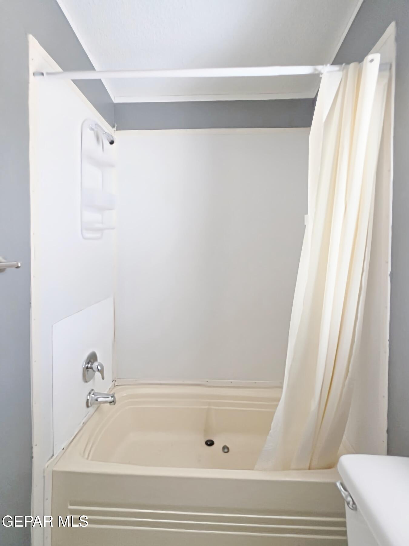 101 Clydesdale Road Dell City, TX 79847 - Photo 49 of 90 a bathroom with a bathtub and a shower