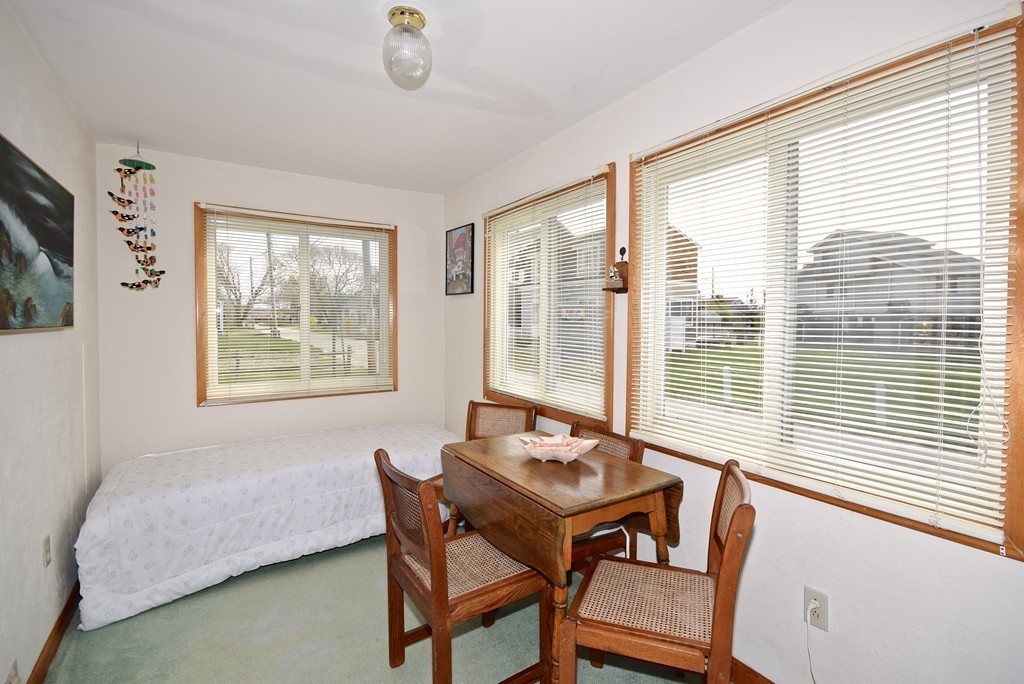 6 Beach Street Wareham, MA 02571 - Photo 10 of 19 a view of a dining room with furniture and windows