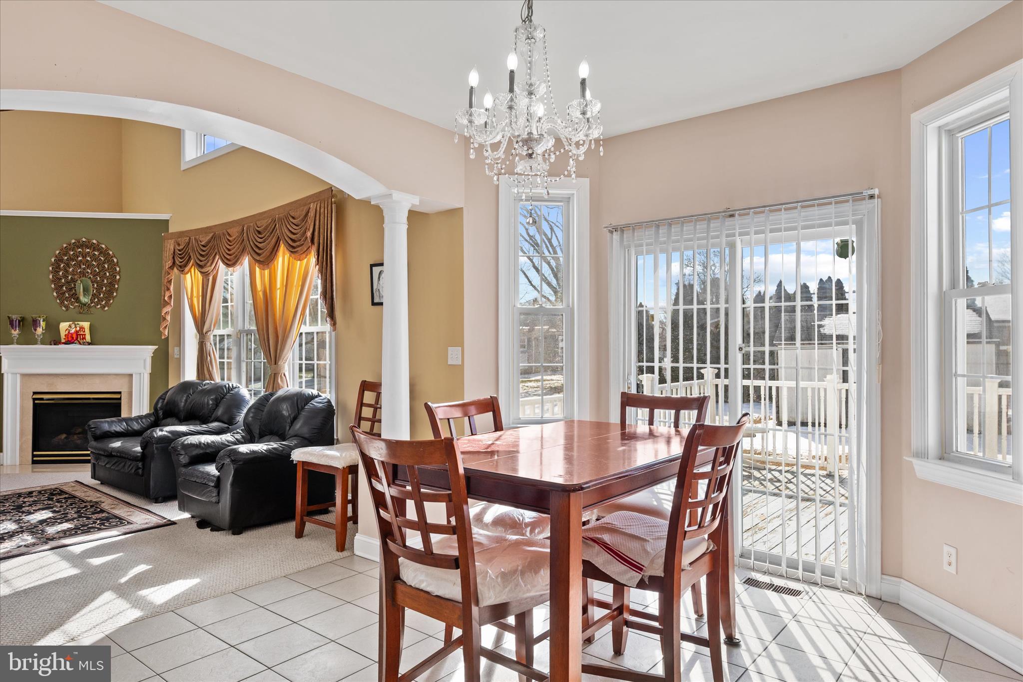 108 Franklin Avenue Berlin, MD 21811 - Photo 12 of 62 a view of a dining room with furniture window and wooden floor