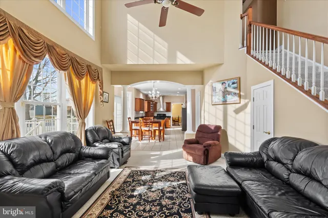 a living room with furniture or couch and a wooden floor