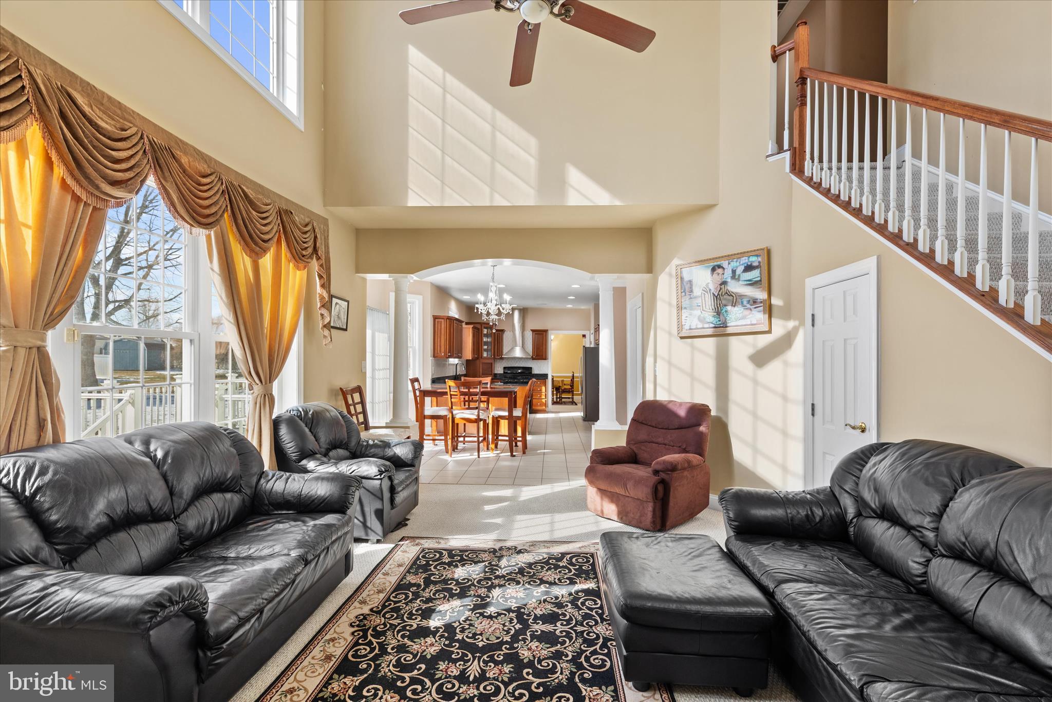 108 Franklin Avenue Berlin, MD 21811 - Photo 19 of 62 a living room with furniture fireplace and a large window