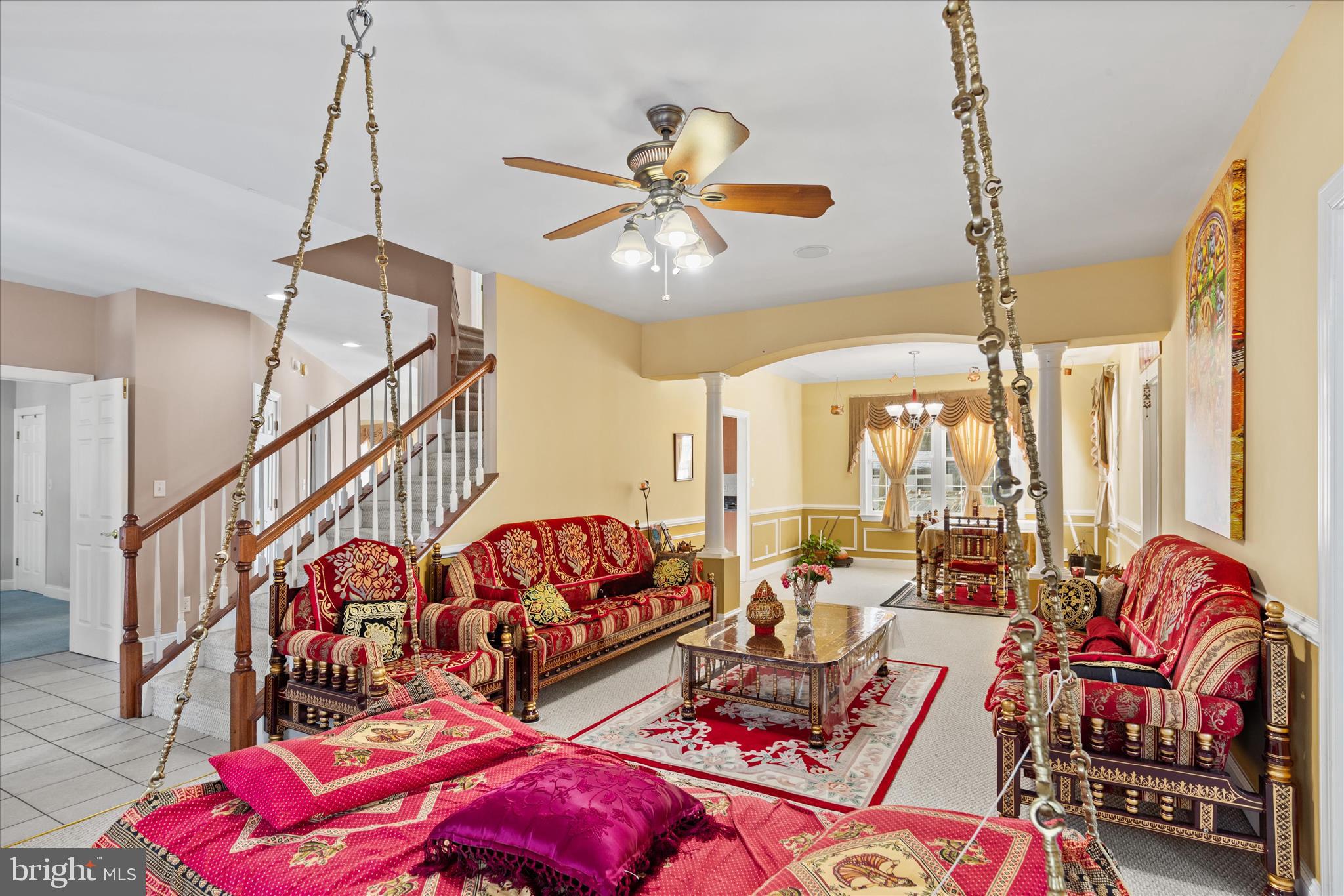 108 Franklin Avenue Berlin, MD 21811 - Photo 29 of 62 a living room with lots of furniture and a chandelier