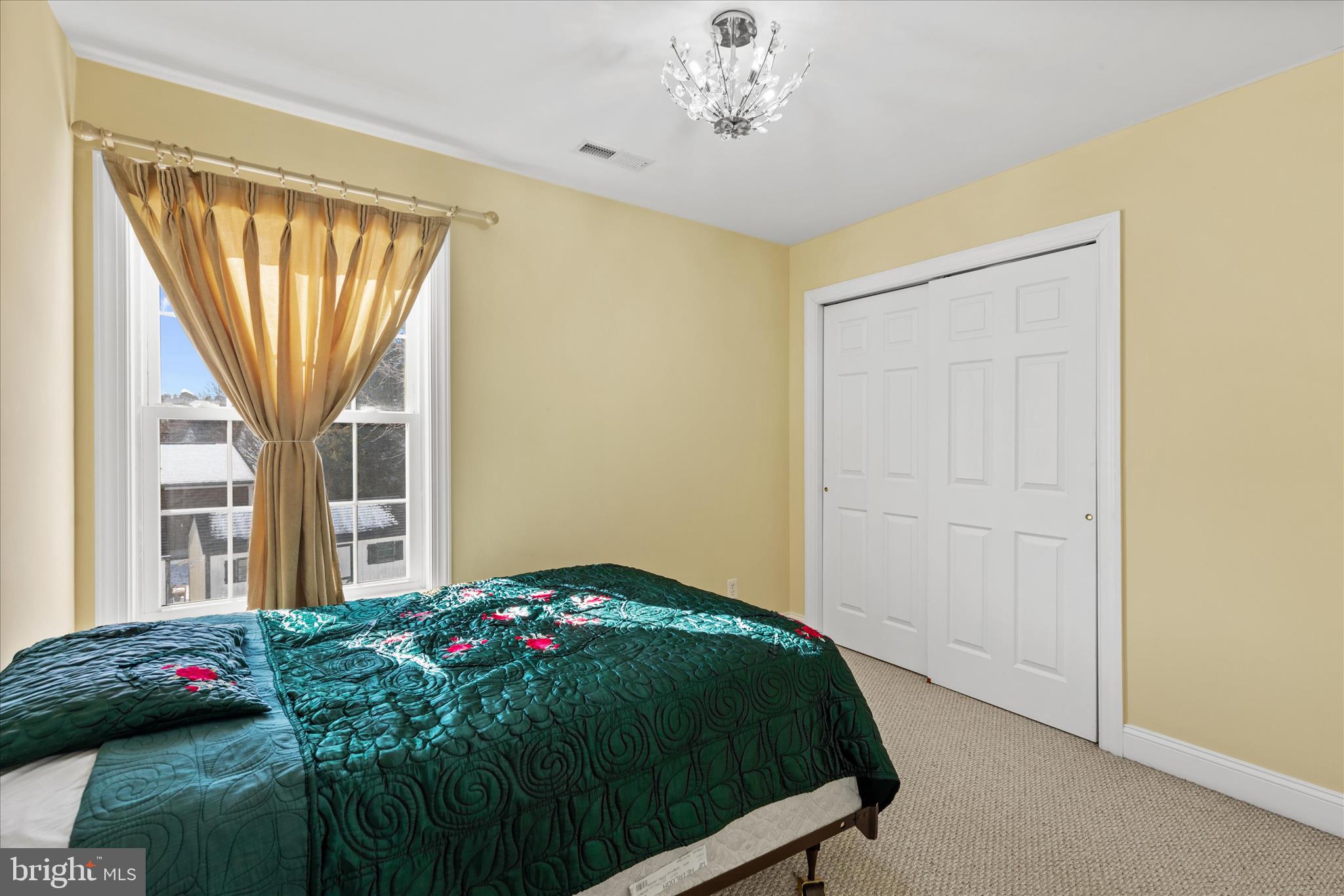 108 Franklin Avenue Berlin, MD 21811 - Photo 50 of 62 a bedroom with a bed and a window